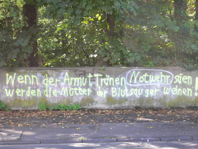 blutsauger armut blutsauger m�tter mauer wand sprayen weinen 