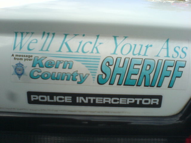 we'll kick your ass! sheriff auto aufkleber nippes 