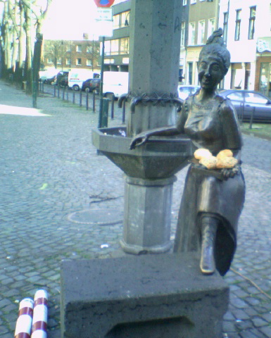 open air fr�hst�cksbuffet skulptur s�dstadt frau statue br�tchen 