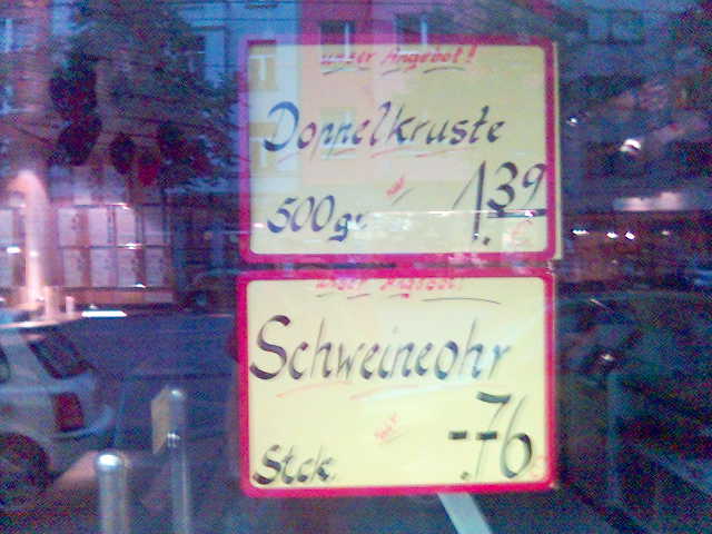 Schweinekruste essen fleisch kruste schaufenster schild schwein 